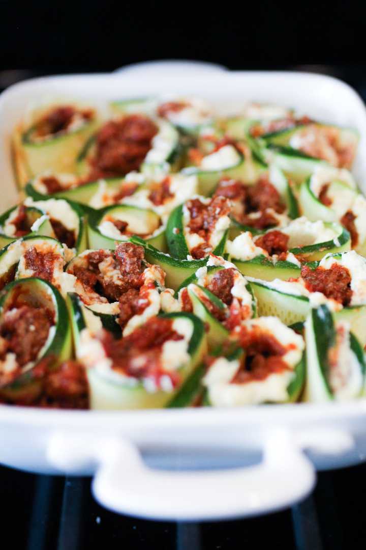 casserole dish filled with lasagna zucchini rolls