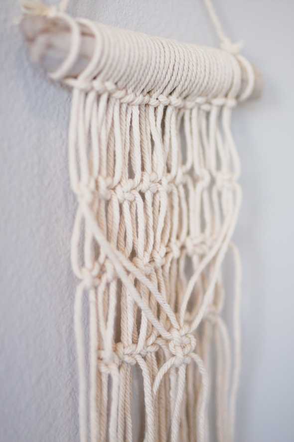 close up of macrame wall hanging