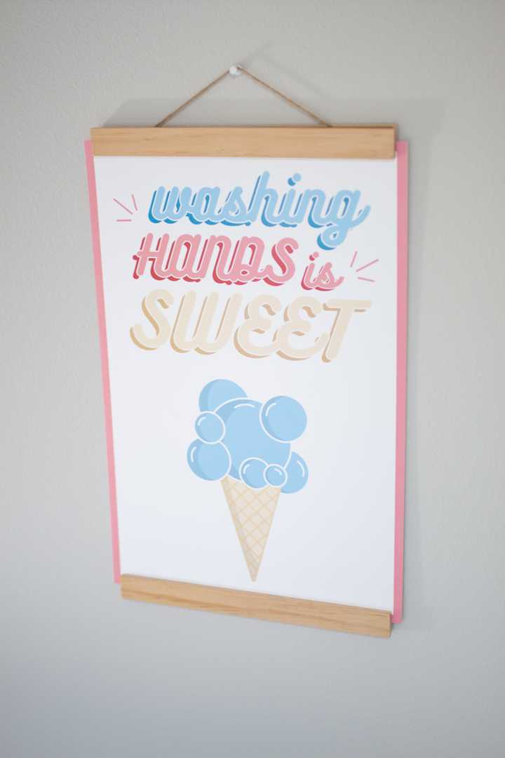 washing hands is sweet poster on wall