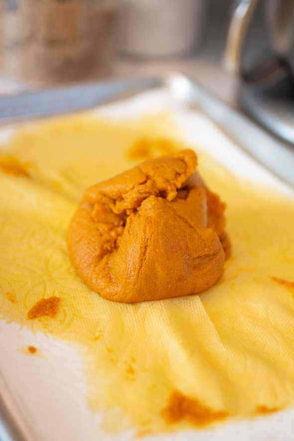 pumpkin puree in a ball on a cookie sheet