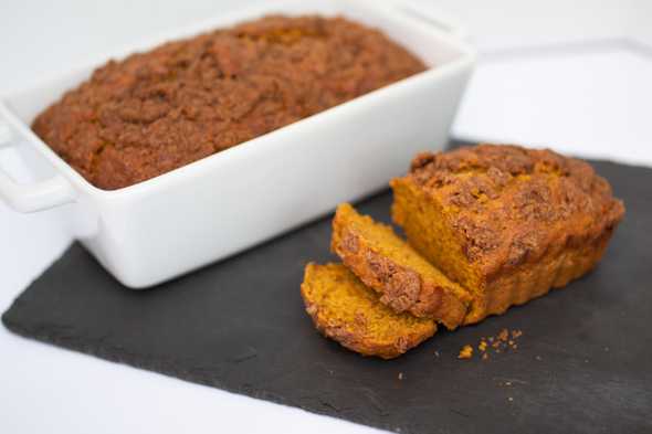 sliced pumpkin banana streusel bread on a platter