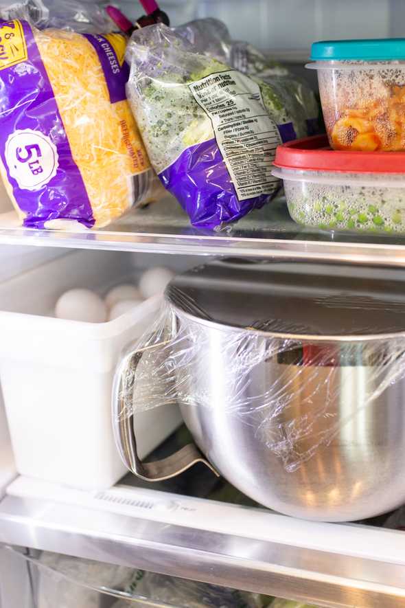 mixing bowl inside of a fridge