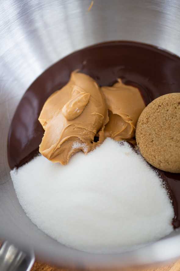 bowl filled with melted chocolate, butter, and sugars