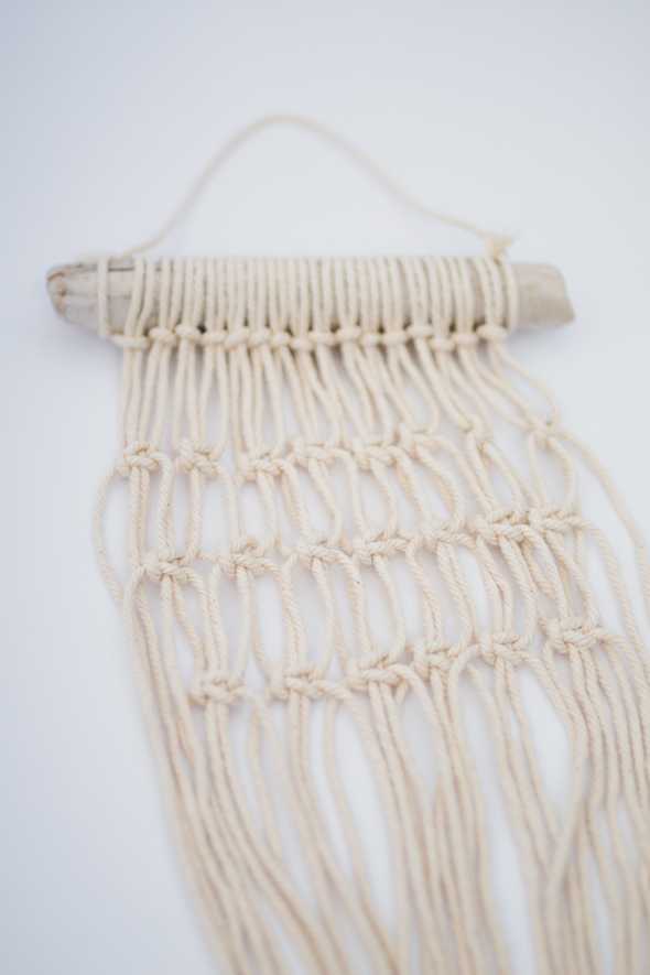 three rows of macrame square knots