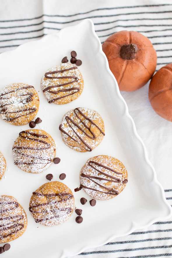 cookies and chocolate chips on a white platter
