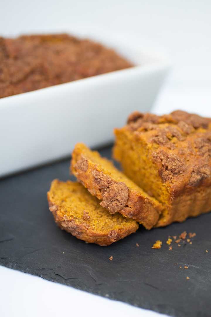 sliced pumpkin banana streusel bread on a platter